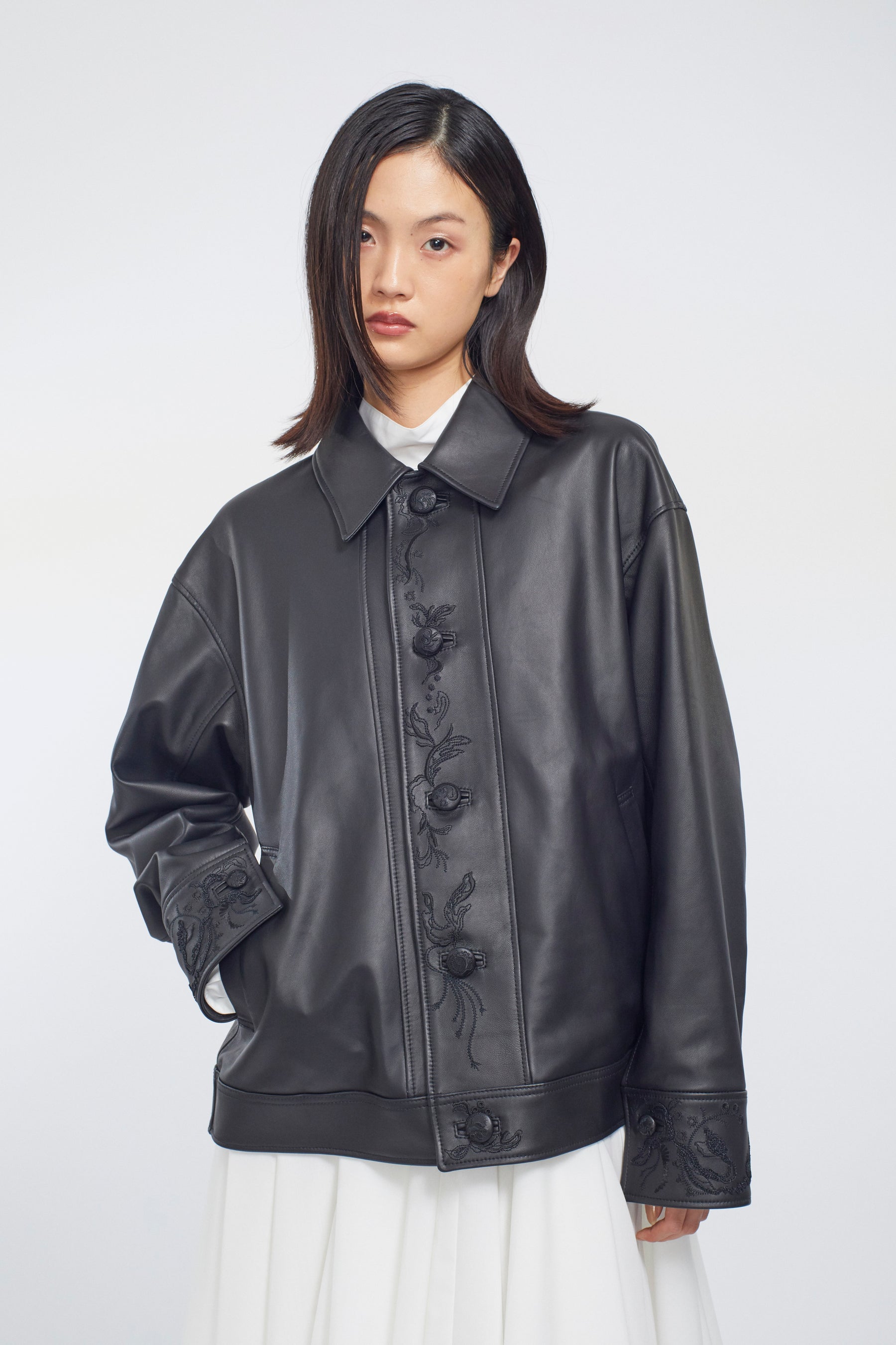 Relief embroidered leather jacket (Black)