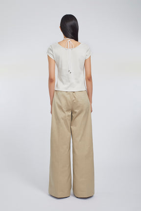 Relief embroidered chino trousers (Beige)